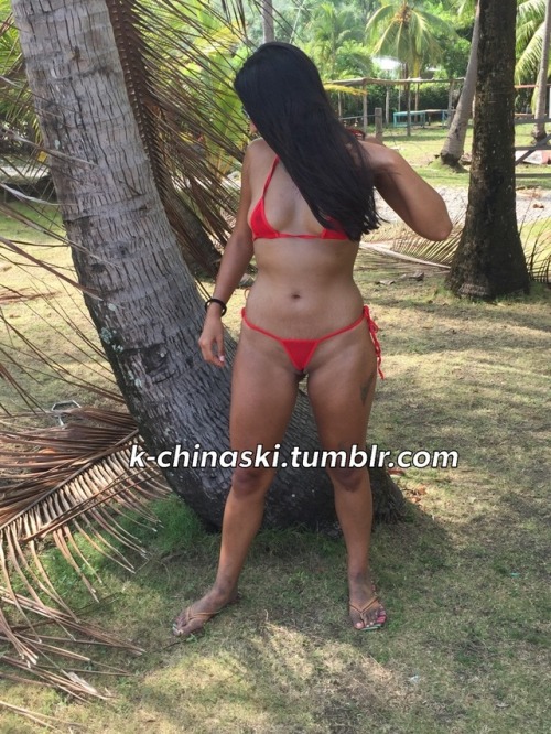 k-chinaski:Exhibitionist wife with her red sheer microbikini....