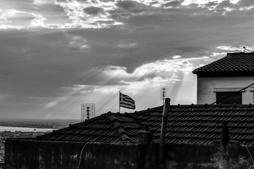 thessaloniki greece skg flag sky clouds sunset