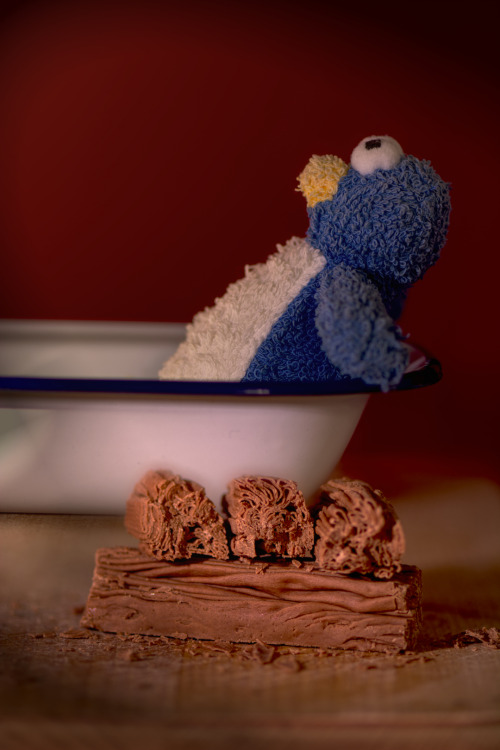 jellytussle:
“The meaning of life through photography of chocolate part 3
“Only the crumbliest, flakiest chocolate…” could persuade Penguin to be photographed in the bath
”