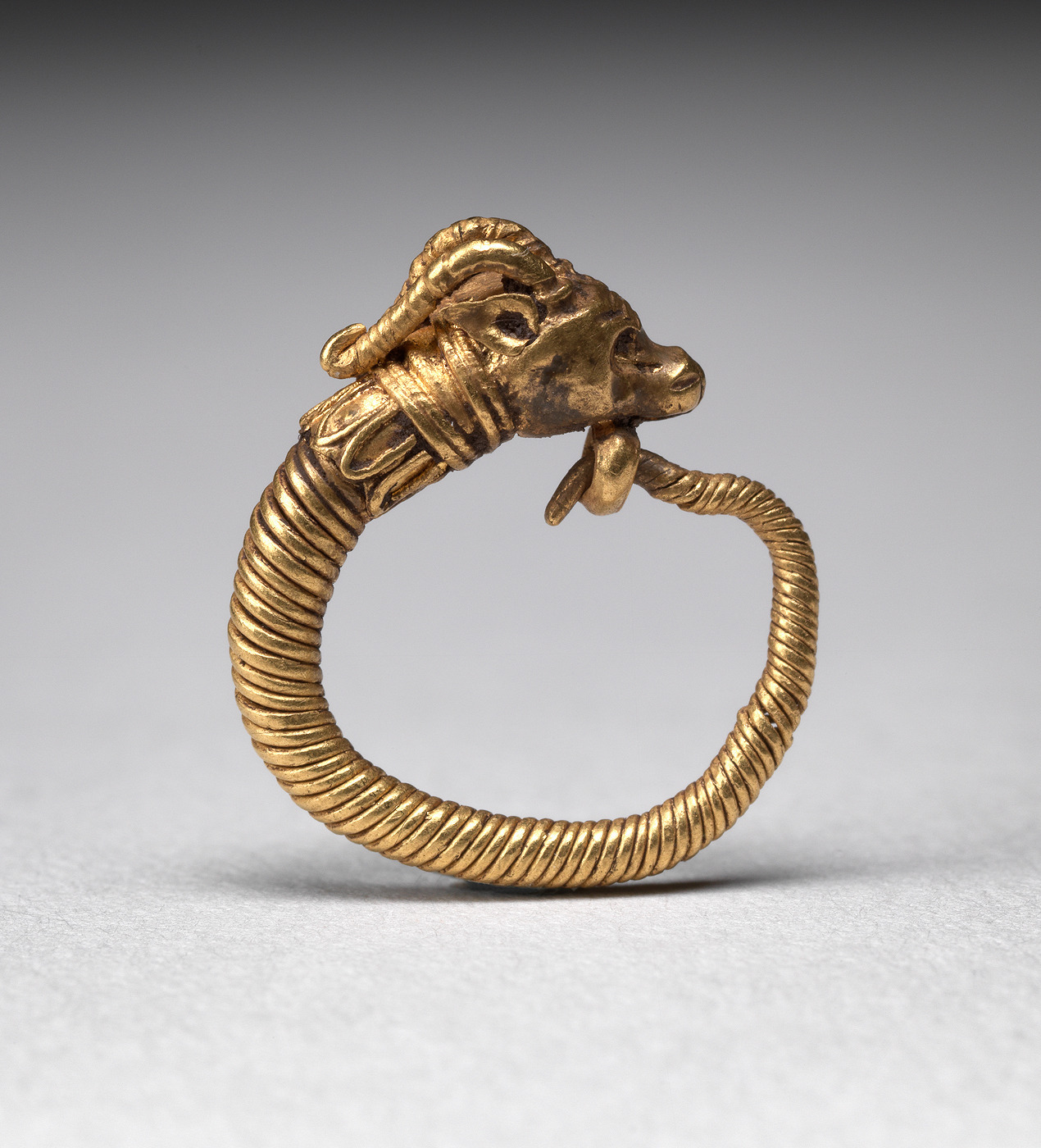 Earring with ram’s head “The god Amun was often portrayed as a ram and both were associated with creativity and virility.
Earrings were worn by men and women, both in life and after death, and were made in many different shapes, using a variety of...