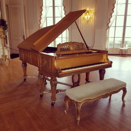 Gilded Piano in the ballroom (at Rosecliff)