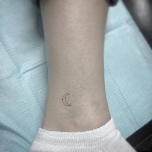 By Jin · Hoa Eternity, done at Mischief Tattoo, Manhattan.... small;jin;astronomy;single needle;micro;line art;tiny;ankle;ifttt;little;crescent moon;minimalist;moon;fine line