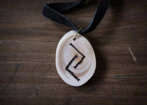 loitsucrafts:Wooden rune necklaces bearing the viking runes...