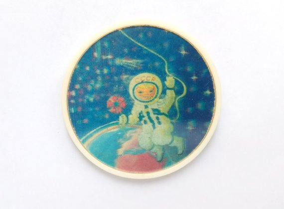 Large plastic cosmonaut button (buy here)