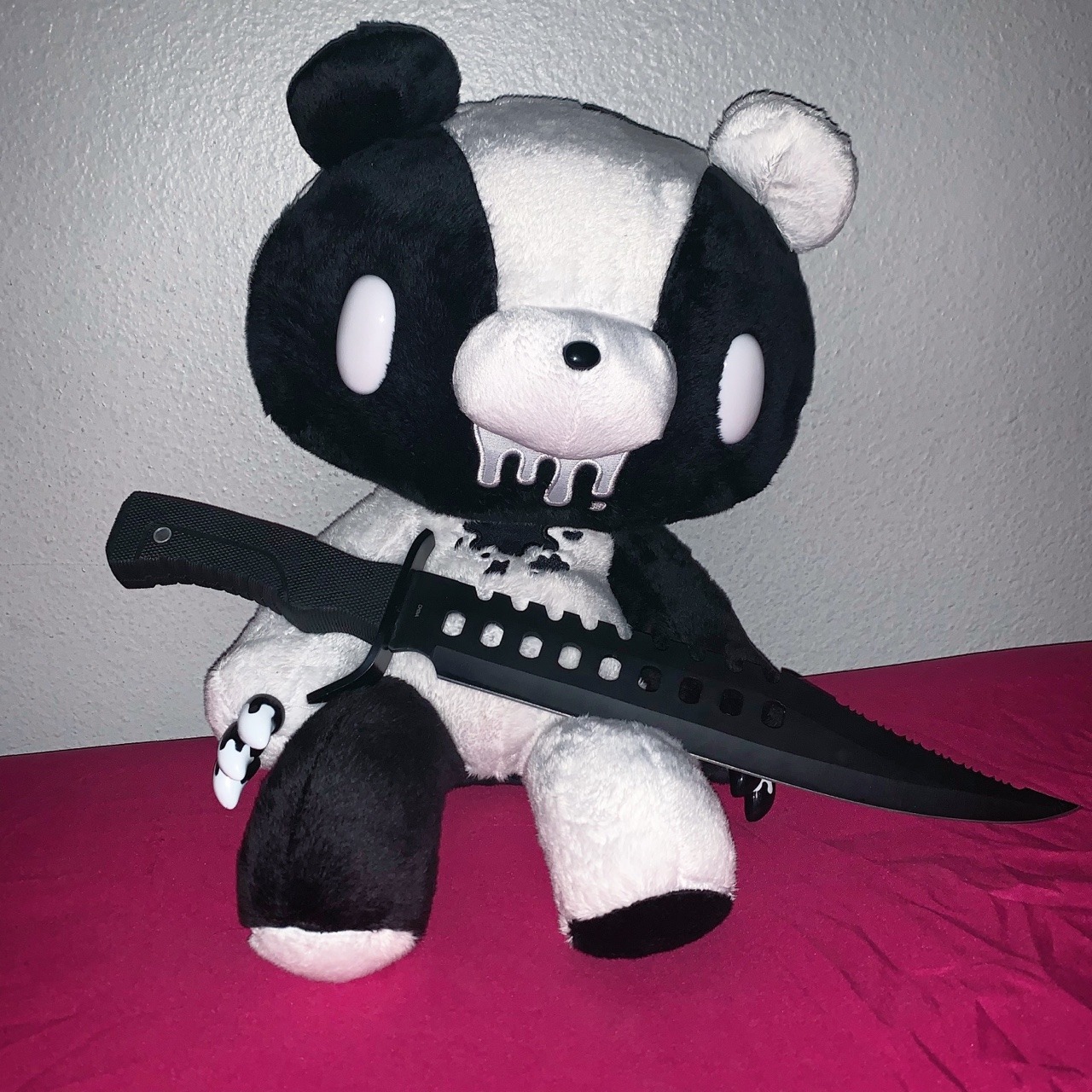 plush with knife