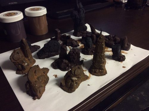 A dozen terrain elements I painted over the weekend. These are...