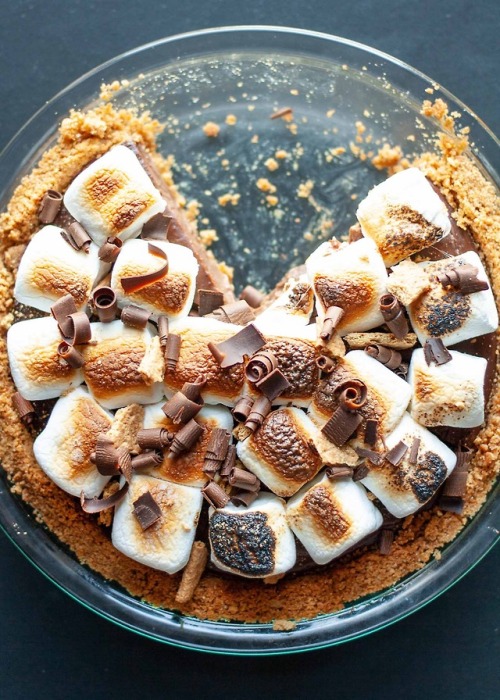 food smores pie smores marshmallows pie toasted marshmallows baked cocoa powder unsalted cocoa powder graham crackers cornstarch milk whole milk corn starch semi sweet chocolate semisweet chocolate sweets chocolate curls vanilla extract chocolate shavings 3 egg yolks baking dessert egg yolks graham cracker crust unsalted butter butter