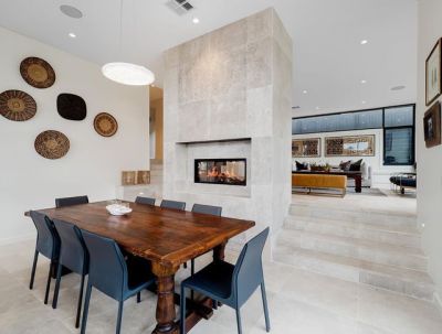 Open plan living, perfect for winter weekend entertaining, filled with warmth from our central feature fire place and an abundance of natural light