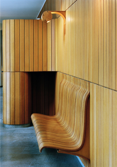 scandinaviancollectors:<br /><br />A wooden wall mounted bench by Hans Asplund’s at the Eslöv Civic Hall (Sweden), 1957. Photograph by Åke E:son Lindman. / Adamsky<br />