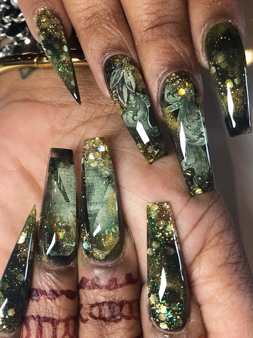 angel nails, ivy nails, rainbow nails, victoria nails, dnd gel polish Sculpted Coffin Nails | Encapsulated Dollar Bill | Marbled Gold and Black. . I have never been a big fan of Money Nails but I actually REALLY like these. . . your next Full Set, Fill, or Pedi service at pampernailgallery.com Now open in Fremont, California!. Click nowselect a service, and tap my name to book an appointment with me. DM me  if you have any questions . . Tags: , getpamper , pampernailgallery , nails , oaklandnails , sanjosenails , sfnails , bayareanails , celebritynails , bayareanailtech , celebritynailtech , sculptednails , nailforms , acrylicnails , clearnails , nails , nailsonpoint , nailporn , nailpro , moneynails , greennails , vegasnails , blacknails , encapsulatednails , glitternails , goldnails , coffinnails , stilettonails , marblenails , fancynails , nailart 