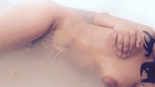 hedonistic-masochism:Taking pics in the bath are a great...