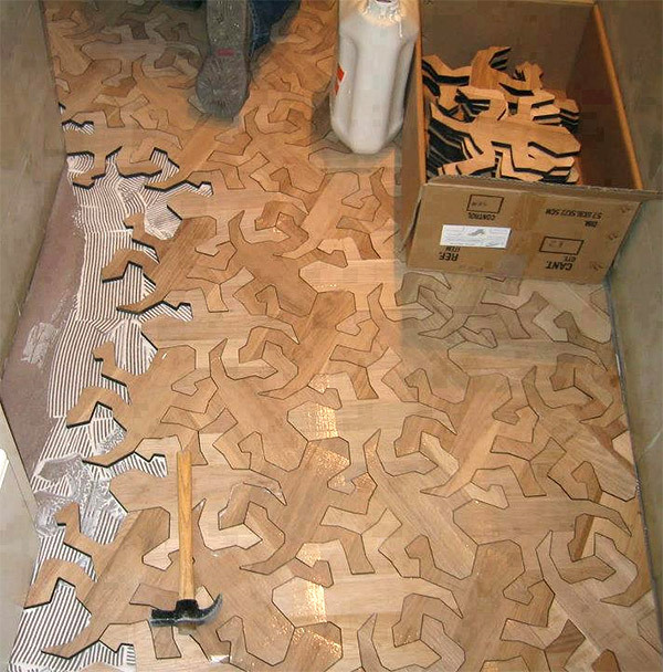 wood-yeah: “ Arbore, a flooring contractor in Madrid, Spain, created these awesome interlocking hardwood pieces in the form of M.C. Escher’s famous geometric Reptiles. [via Technabob] ”