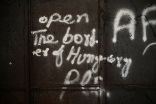 yahoonewsphotos:Trapped in Serbia, migrants shelter in a...