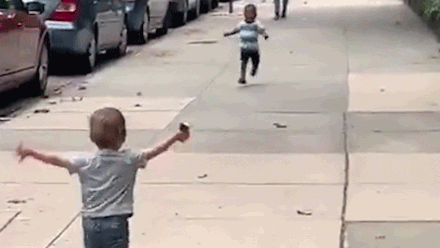 Paul' Web Logs: Toddlers Running To Each Other for a HUG On NY Street