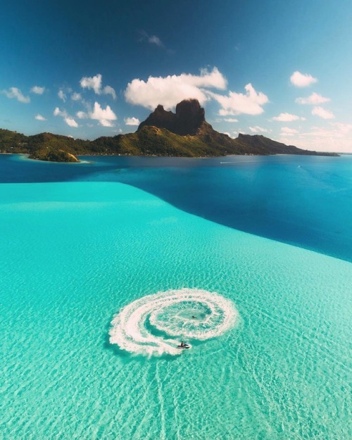 earth:Jet skiing in Bora Bora. @