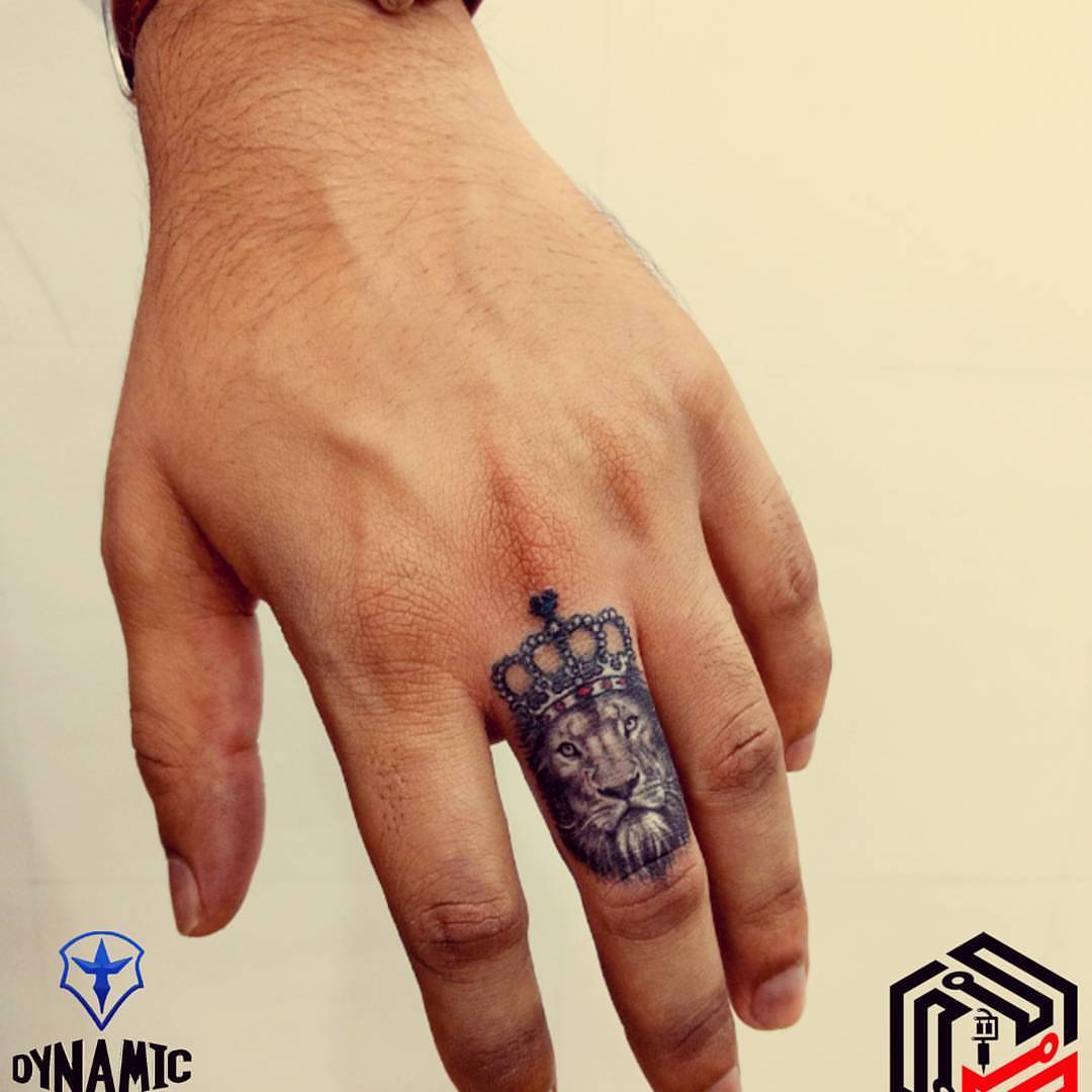 Scube Tattoology Lion Face With King Crown Tattoo On A Finger