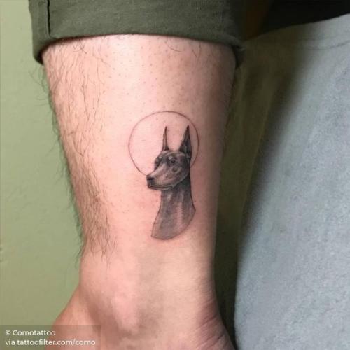 By Comotattoo, done in Seoul. http://ttoo.co/p/29188 small;pet;dog;patriotic;single needle;animal;germany;ankle;como;facebook;twitter;portrait;doberman