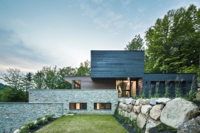 archatlas:<br /><br /><br />Estrade Residence in Quebec<br /><br /><br />Located in the verdant Laurentians in Quebec, the Estrade Residence reveals itself discretely on the shores of Lac de la Cabane in St-Adolphe d’Howard. It is by studying the steep and rocky topography of the place that MU Architecture decided to highlight the peculiarities of this site with an adapted and captivating architectural intervention. <br />Follow the Source Link for images sources and more information. <br />