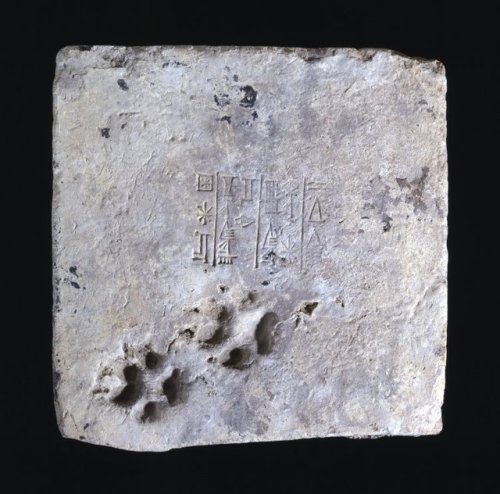 historyarchaeologyartefacts:Fired clay brick from the ziggurat...