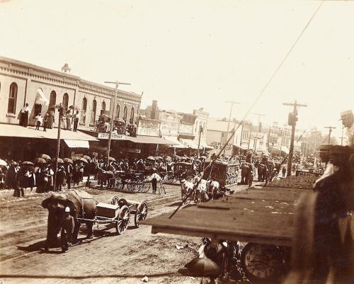 A circus parade going through downtown Iowa Falls, Iowa. circa 1890. [1380x1108] Check this blog!