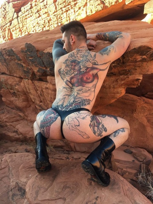 lockedlatex:This boy’s going accentuates his awesome tattoos. ...