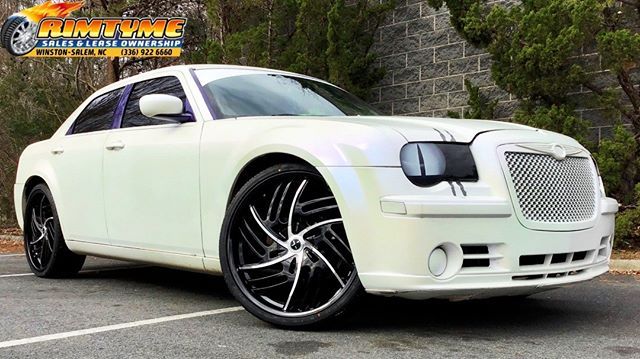 2008 Chrysler 300 sitting on 24” Starr 005 Panda Black and Machined wheels and 255//30-24 Fullrun tires via RimTyme of Winston Salem, NC (336) 922-6660