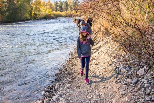 girl walking by the Adams River at Tsutswecw Provincial Park British Columbia
