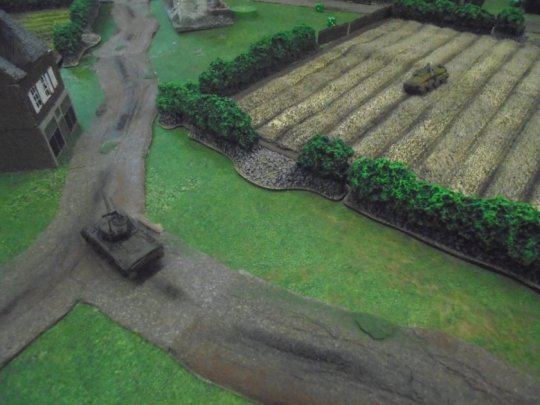 5 SdKfz233 shoots Sherman
