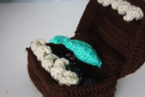 thatcrochetnerd:Mimic Dice BagI made a mimic dice bag to...