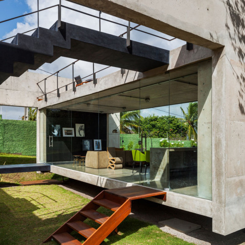 designismymuse:Divided Concrete House Connected by...