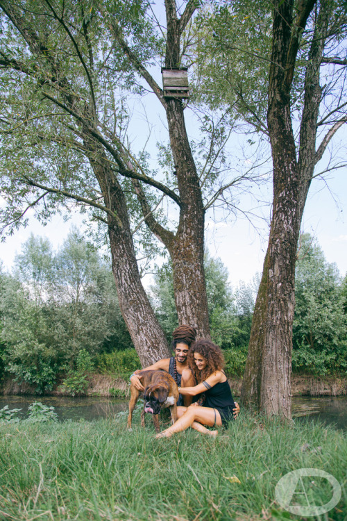 Laughing young couple with their dog