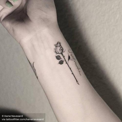 By Kane Navasard, done in Los Angeles. http://ttoo.co/p/27453 kanenavasard;flower;music;small;treble clef;single needle;rose;facebook;nature;wrist;twitter