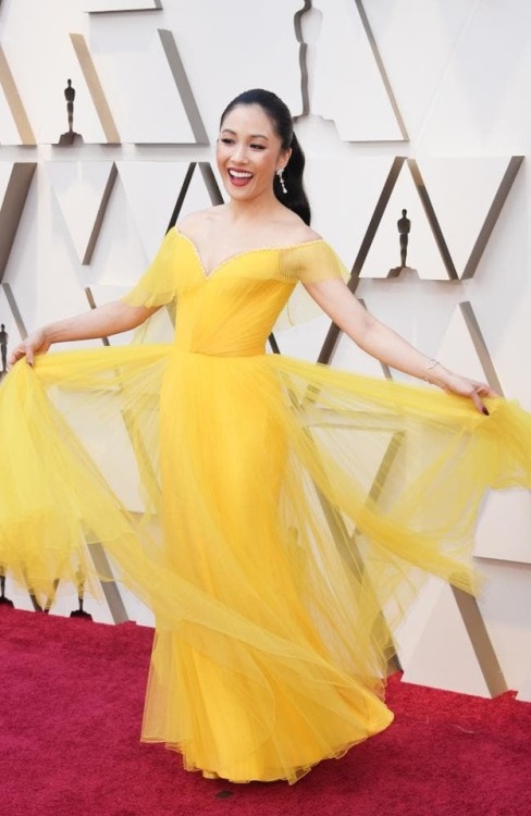Crazy Rich Asian actress Constance Wu in yellow fit and flare...