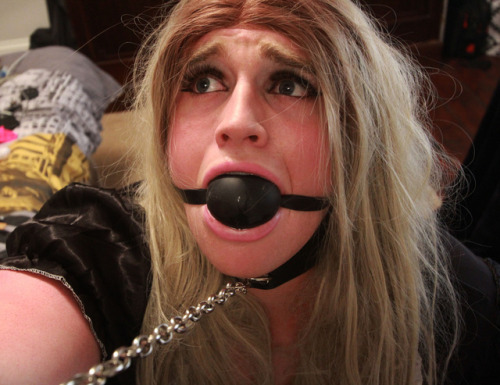 sissy-slut:Gagged, locked and helpless, come take my lead?