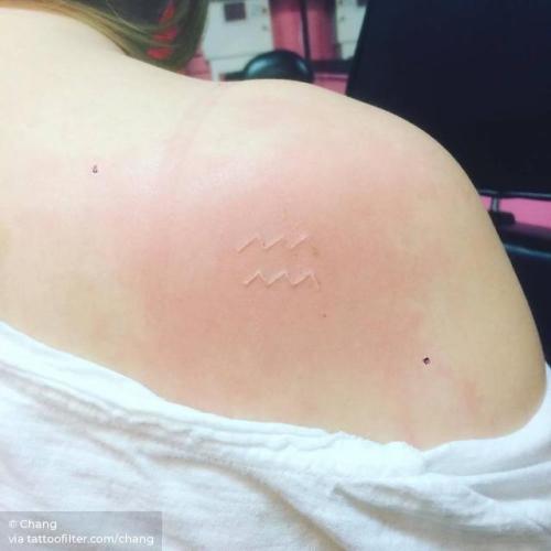 By Chang, done at West 4 Tattoo, Manhattan.... aquarius symbol;small;zodiac symbol;chang;micro;symbols;tiny;white;ifttt;little;astrology;shoulder blade;minimalist