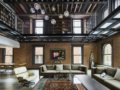 Open living area adds a second story via a steel platform supported by a glass floor in this TriBeCa loft. [1333 × 1000]