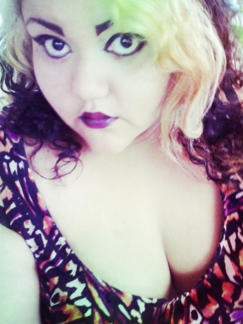 [fat/poc goth with bleached hair wearing purple...