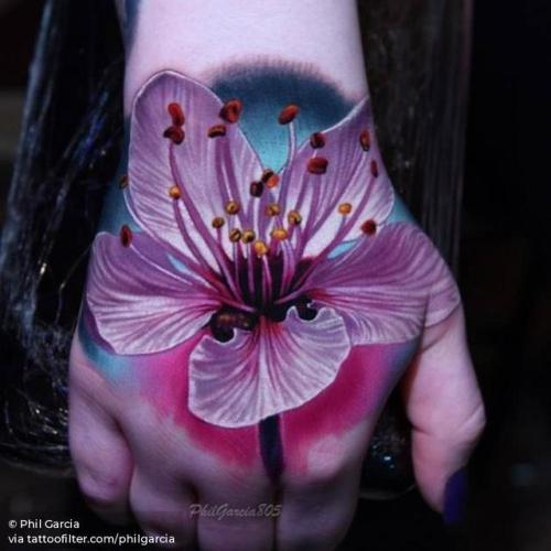 By Phil Garcia, done at Hell City Tattoo Festival Columbus 2018,... cherry blossom;facebook;flower;four season;hand;medium size;nature;philgarcia;realistic;spring;twitter