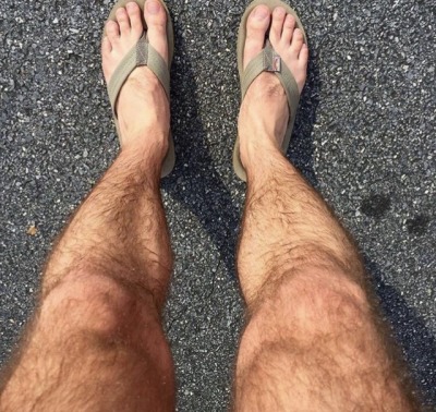 male feet in flip flops