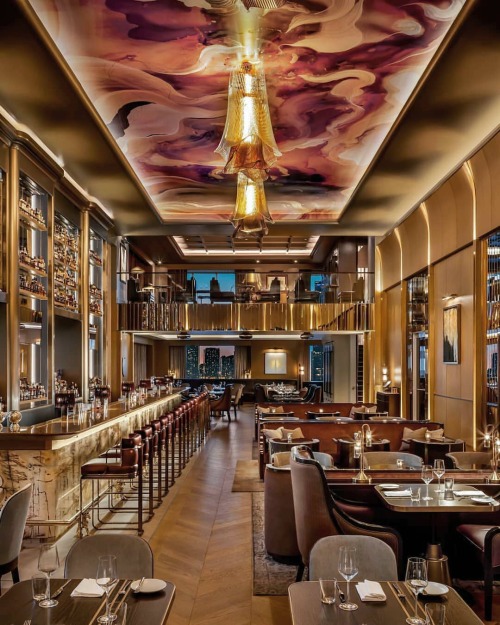 Bar exquisite in St. Regis Hotels, Toronto, beneath a ceiling…