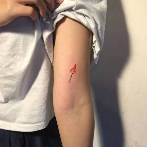 By Masa Tattooer, done in Seoul. http://ttoo.co/p/139730 small;bicep;micro;masa;tiny;fire;match;ifttt;little;nature;other;illustrative