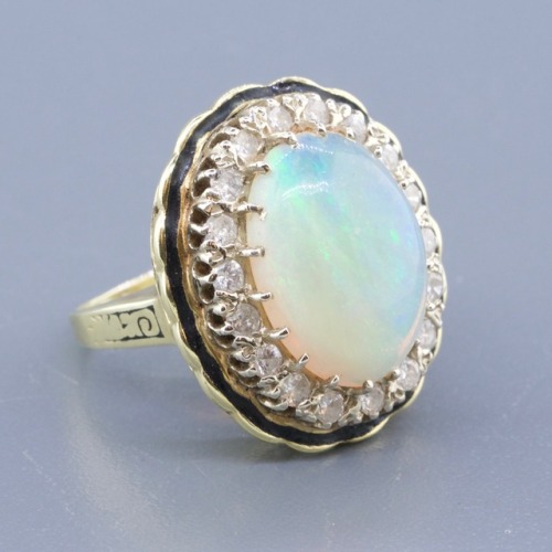 allaboutrings:14k Gold Opal and Diamond Ring