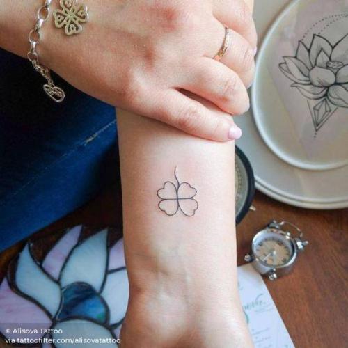 By Alisova Tattoo, done in Moscow. http://ttoo.co/p/29281 flower;good luck;patriotic;alisovatattoo;micro;clover;line art;ireland;st patricks day;facebook;nature;wrist;twitter;minimalist;other;fine line
