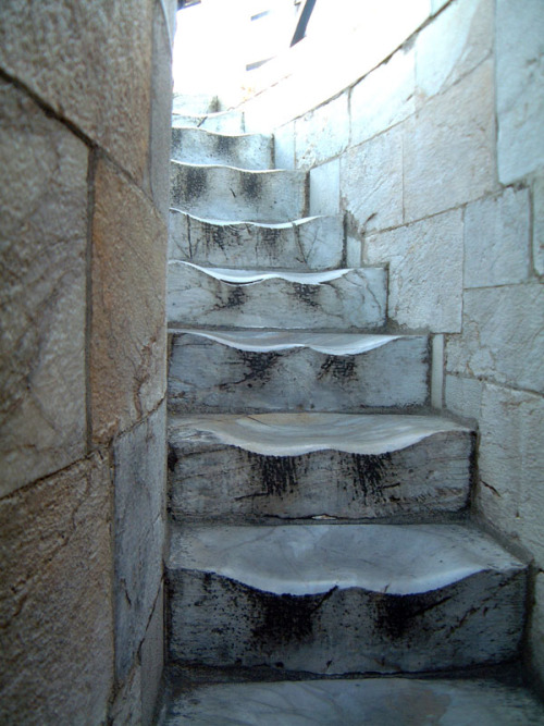 sixpenceee:The worn marble steps at the Leaning Tower of Pisa....