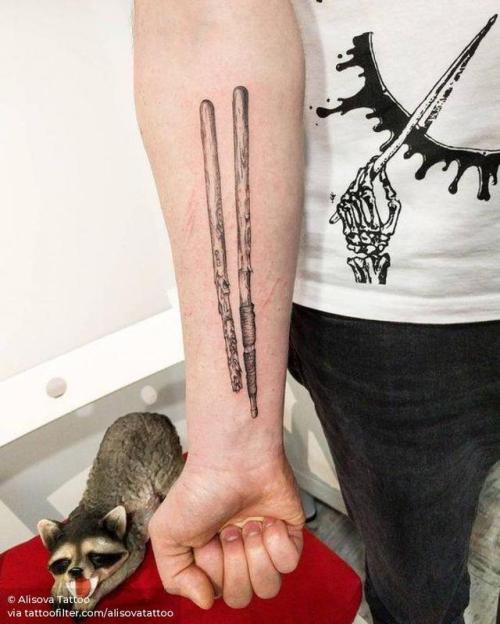 By Alisova Tattoo, done in Moscow. http://ttoo.co/p/29387 music;alisovatattoo;facebook;twitter;music instrument;inner forearm;medium size;drumstick;illustrative