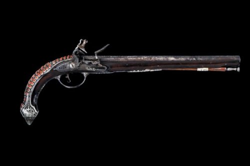 peashooter85:An original silver and coral mounted flintlock...