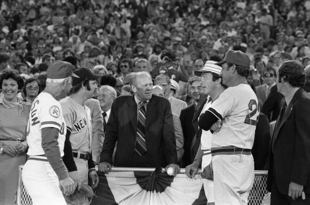 U.S. National Archives — President John F. Kennedy throws out the first...