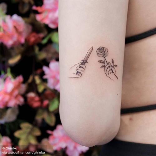 By Ghinko, done in Manhattan. http://ttoo.co/p/35088 anatomy;couple;facebook;flower;ghinko;hand holding flowers;hand;knife;love;nature;rose;single needle;small;tricep;twitter;weapon