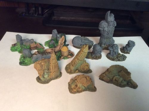 A dozen terrain elements I painted over the weekend. These are...