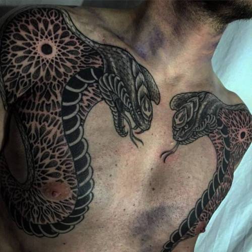 By Jondix, done at Seven Doors Tattoo, London.... individual matching;matching;cobra;big;animal;chest;snake;facebook;blackwork;twitter;jondix;sacred geometry